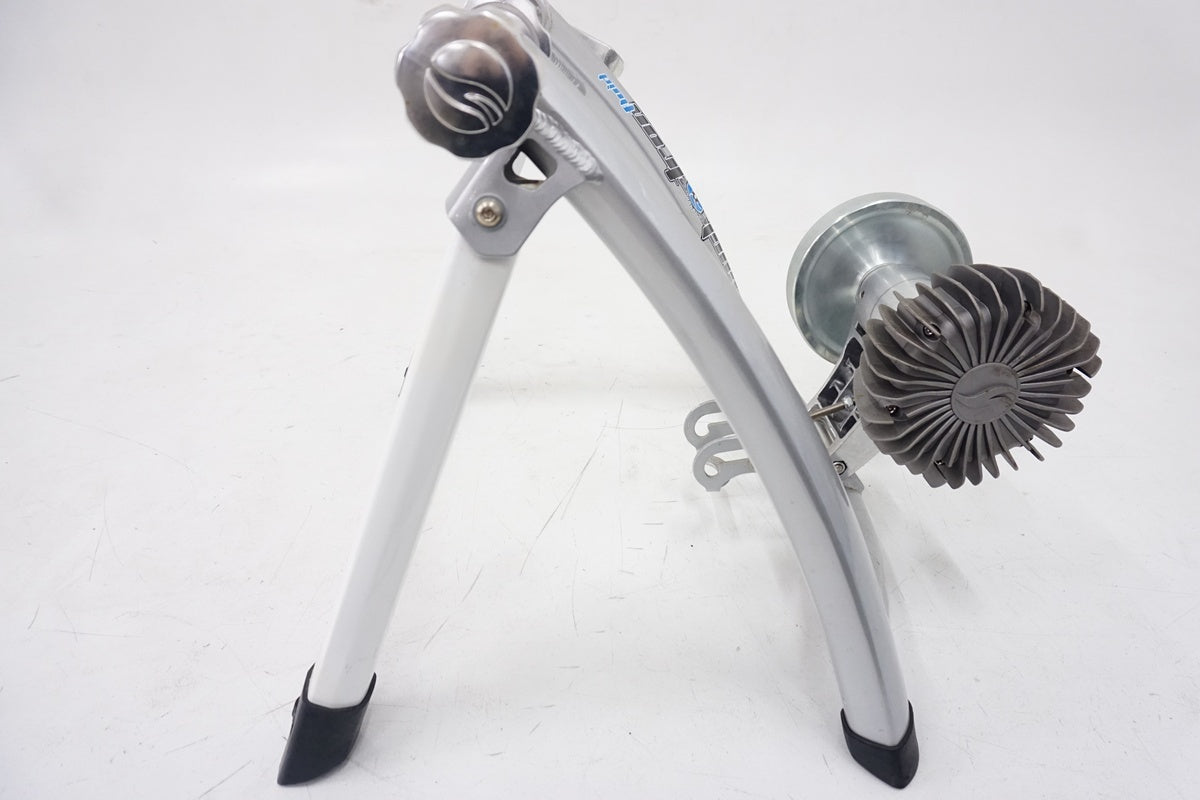 Indoor cycling trainer for winter sessions, featuring fluid