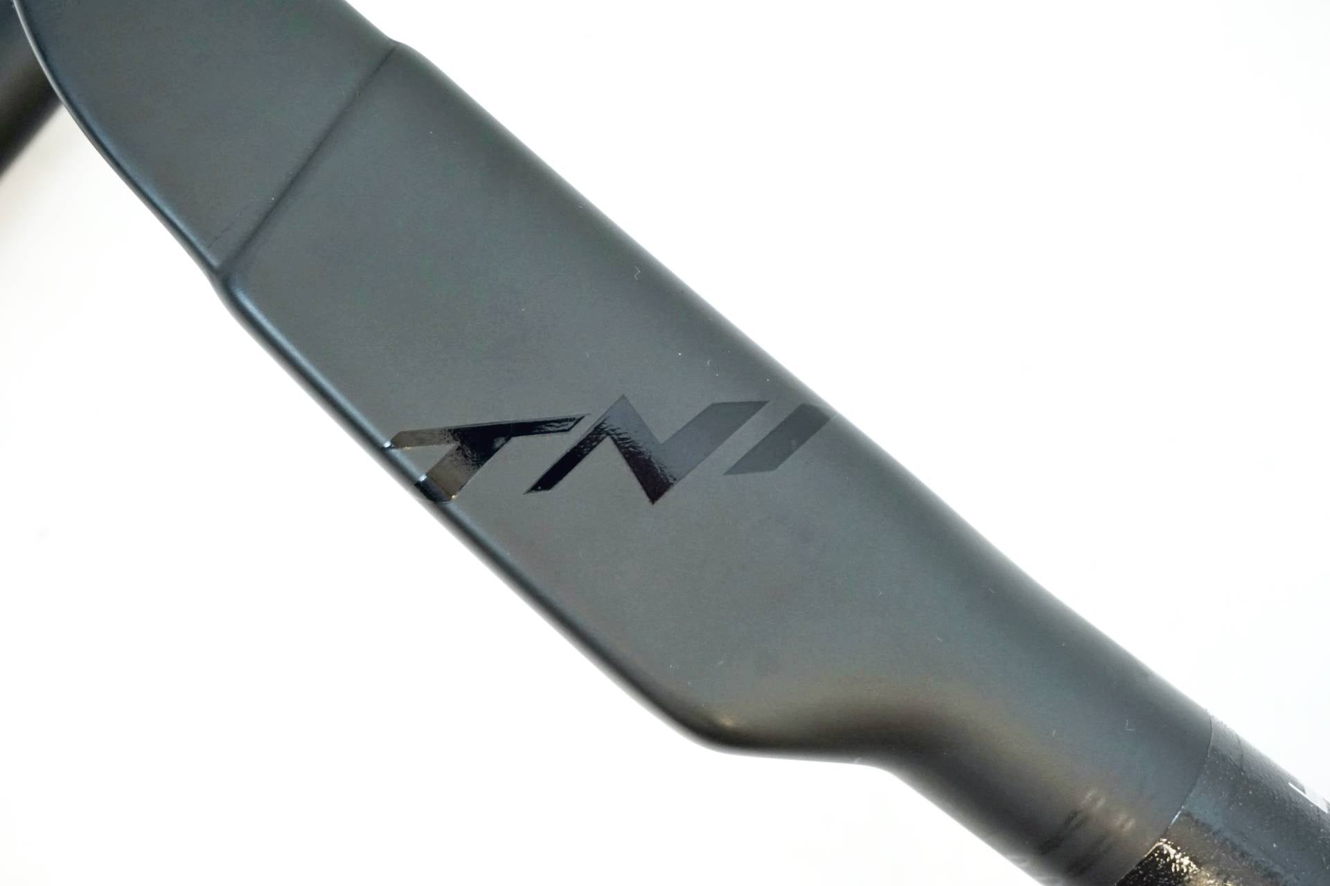 TNI 「ティーエヌアイ」 EAGLE CARBON Φ31.8 400mm ドロップ
